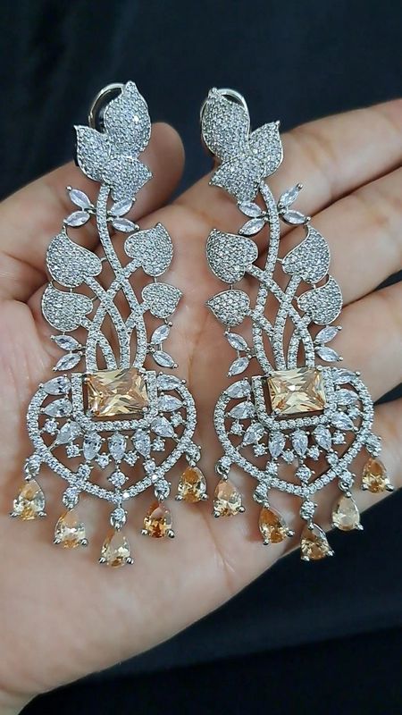 slim and long earrings golden
