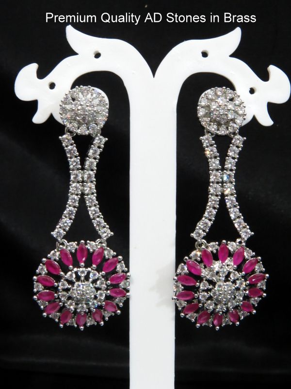 american diamond earrings magenta