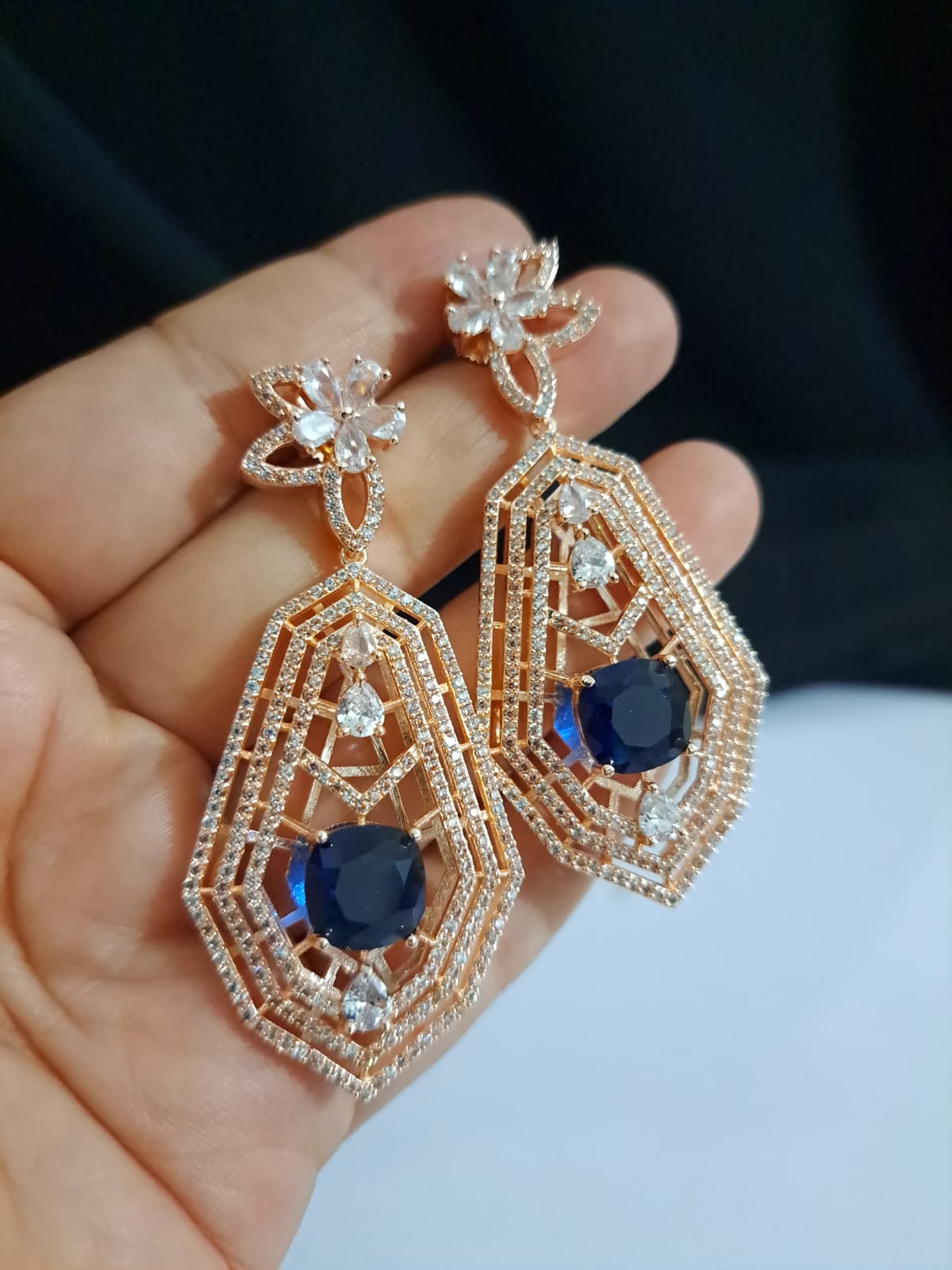 Buy long partywear dangling earrings in blue