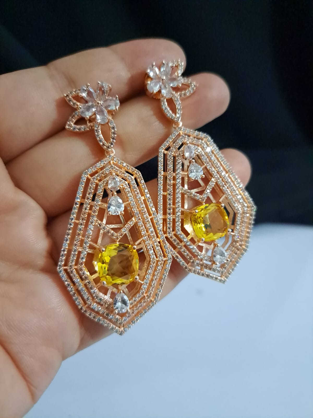 Buy long partywear dangling earrings in yellow