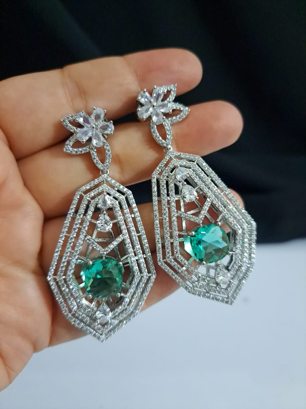 Buy long partywear dangling earrings in teal