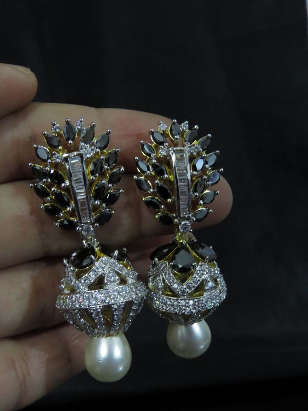 black closed jhumki earrings