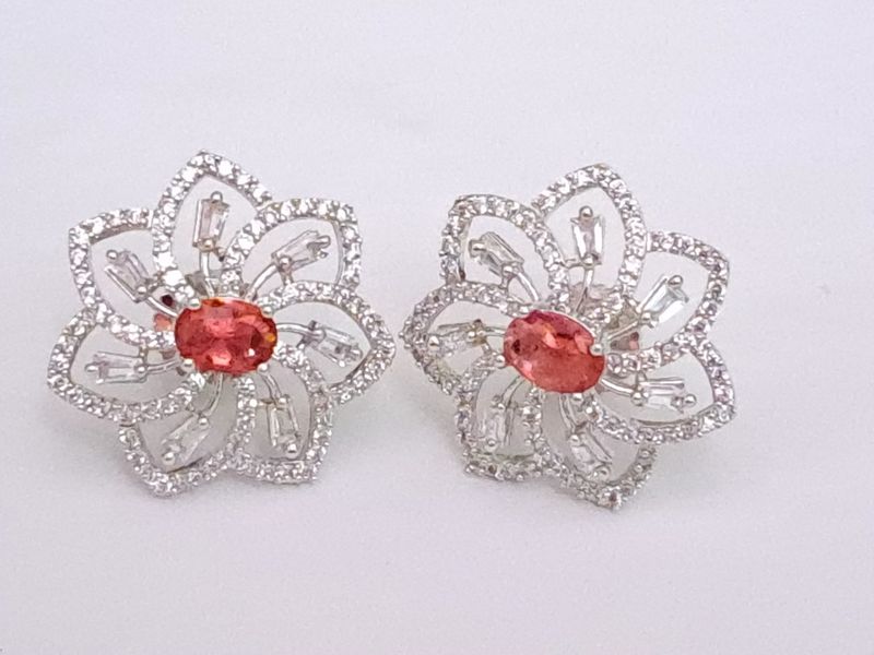 flower with center oval stone in red silver