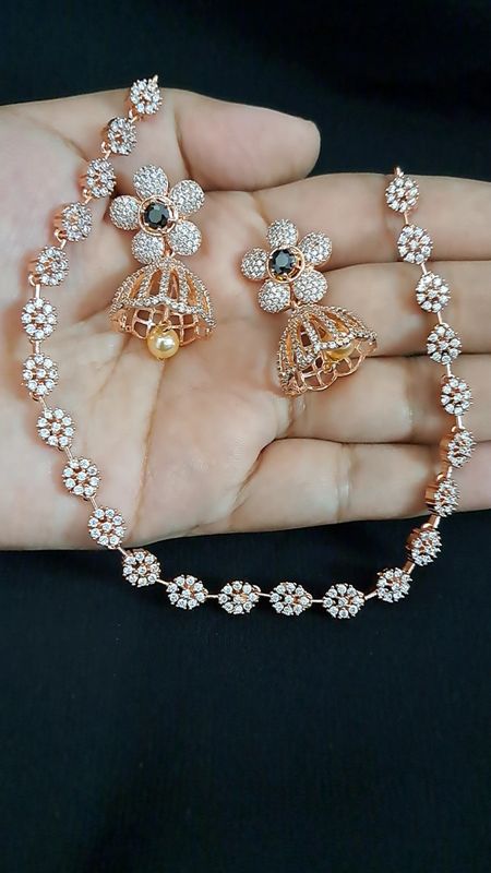 single designer chain with jhumki earrings
