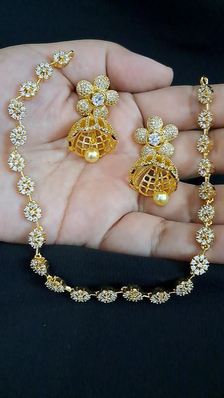 golden ad chain with jhumki earrings