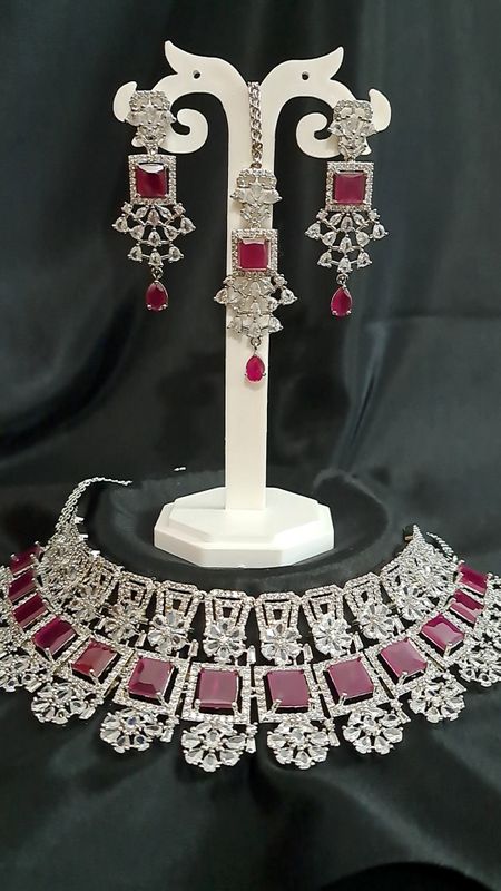 silver choker in magenta stones